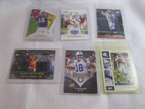 lot 150 image: Peyton Manning Cards...