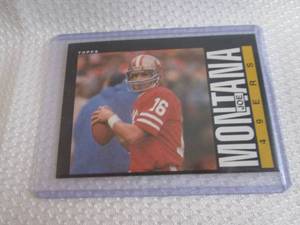 lot 275 image: 1985 Topps Joe Montana Card...
