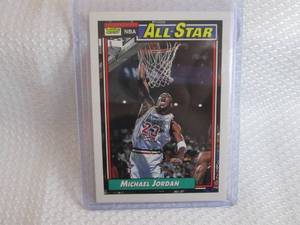 lot 299 image: 1992-93 Topps Michael Jordan Card...