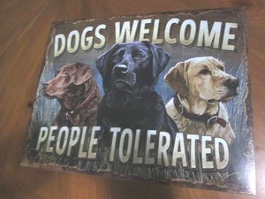 lot 512 image: Dogs welcome, people tolerated metal sign
