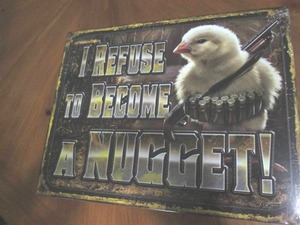 lot 513 image: Chick defense metal sign