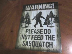 lot 515 image: Dont feed the sasquatch metal sign