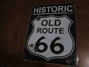 lot 516 image: Historic old route 66 metal sign