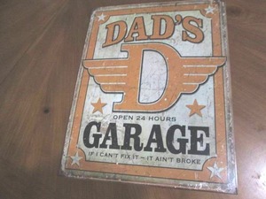 lot 517 image: Dads Garage metal sign