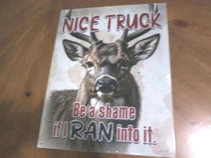 lot 524 image: Truck and buck metal sign