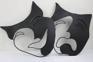 lot 35 image: Black Metal Wall Masks - Abstract Pair Sculpture, 41 in W x 26 in H