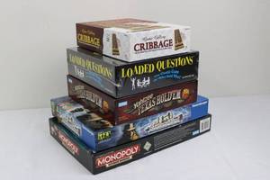 lot 74 image: Scotland Yard, Monopoly Ultimate Banking, Loaded Questions, Yahtzee Texas Holdem, Cribbage (Lot 5)