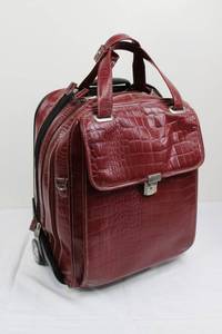 lot 85 image: Crocodile-Embossed Burgundy Leather Rolling Briefcase
