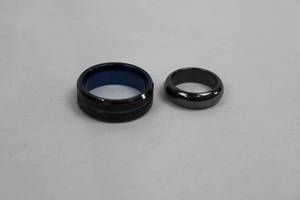 lot 116 image: Triton Rings - Black Rings with Blue Interior (Lot of 2) unknown size