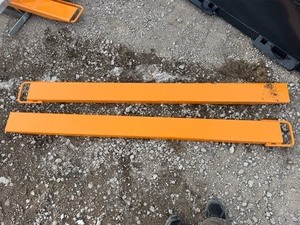 lot 99 image: UNUSED Pallet Forks Extensions