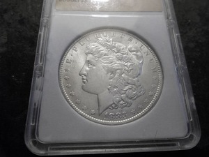 lot 12 image: 1883 O Morgan Silver Dollar Graded In Holder MS66