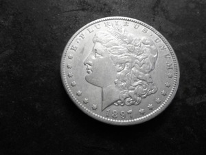 lot 22 image: 1897 O Morgan Silver Dollar