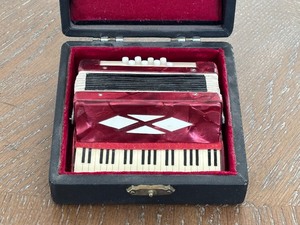 lot 26 image: Miniature Replica Accordion