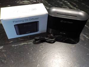 lot 6 image: Flaming Oil Diffuser...