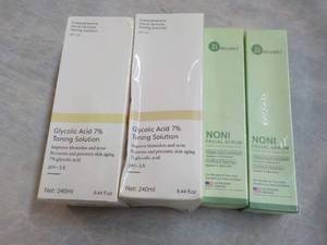 lot 128 image: Toning Solution and Facial Serum...