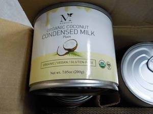 lot 166 image: 8 Cans Organic Condensed Coconut Mi...