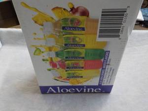 lot 195 image: Aloevine 10 bottles Aloe Vera Drink...