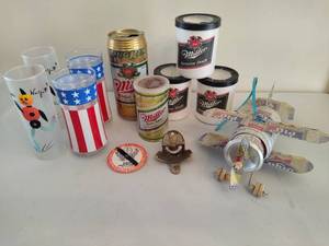 lot 77 image: Assorted BeerBar Related Glassware, Coozies, Can Plane, Bank & More