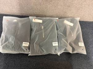 lot 6 image: 3 Sets Of Black Polos And Shorts - Medium