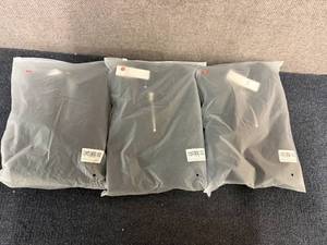 lot 7 image: 3 Sets Of Black Polos And Shorts - Medium