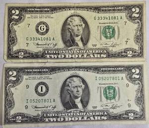 lot 42 image: Two $2 bills.