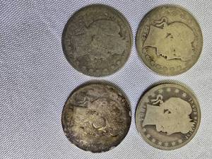 lot 64 image: Four Barber Quarters with a face value of one dollar 1894-P, 1902-O,1907-P & 1912-P