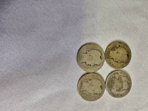lot 65 image: Four Barber Quarters with a face value of one dollar 1902-P, 1904-P,1916-D & NO DATE