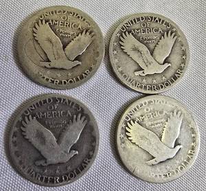 lot 67 image: Four Standing Liberty Quarters, each with a face value of one dollar 1925,1926,1929 &1930