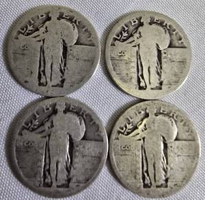 lot 68 image: Four Standing Liberty Quarters, each with a face value of one dollar NO DATES