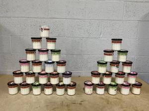 lot 219 image: LOT OF 36 Mrs. Meyers Soy Candles (1 Missing Lid)