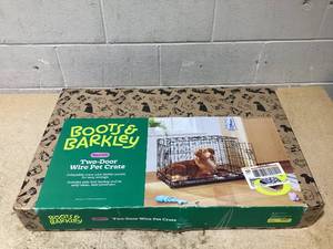 lot 128 image: Boots & Barkley 2 Door Wire Collapsible Dog Crate - M - Black 30 Inches (L), 21 Inches (H) x 19 Inches (W)