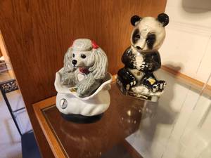 lot 1103 image: Lot of (2) Whisky Decanters - 1973 Jim Beam Tiffany Poodle, 1972 Erza Brooks Panda Bear by Heritage China