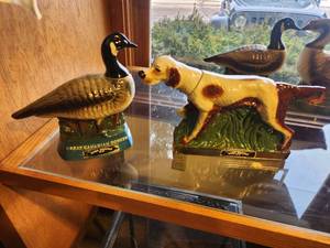 lot 1107 image: Lot of (2) Whisky Decanters - Great Canadian Honker, Erza Brooks Setter Hunting Dog