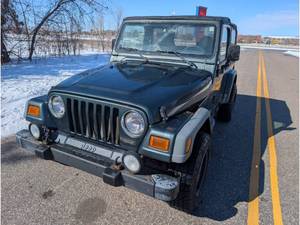 lot 4 image: 2002 Jeep Wrangler Sport - 1 Owner vehicle