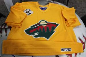 lot 189 image: CCM Minnestoa Wild Yellow Blank Back Jersey  Size Unknown Likely 2XL or Bigger