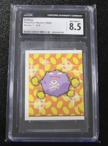 lot 206 image: 1998 Merlin Series 1 Pokemon Sticker Koffing #215 CGC 8.5