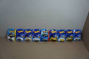 lot 218 image: Hot Wheels - English - Meyers, Mini Cooper, Anglia Panel, Jaguar D-Type