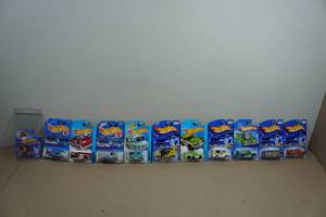 lot 222 image: Hot Wheels - Propper Chopper, Pit Crew Truck, Cement Truck