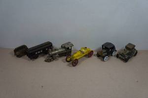 lot 229 image: Vintage Cast Iron Cars and Train