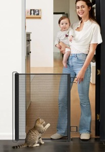 lot 114 image: Retractable Mesh Gate Extra Tall 31 Adjustable Width 43 to 51 Black $31.99 Retail - Brand New