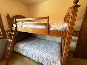 Oak Twin Over Full Bunk Bed with Ladder Spindle Panels Good