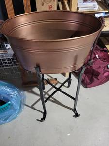 Round Copper Tub Planter with Rope Handles on Black Metal Stand