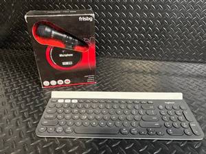 lot 84 image: Frisby FMC-220 Microphone & Logitech Keyboard