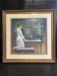 lot 126 image: Framed Art Print - Woman at Piano with Vase of Flowers