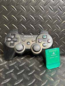 lot 152 image: Sony DualShock 3 Wireless Controller & Green PlayStation Memory Card