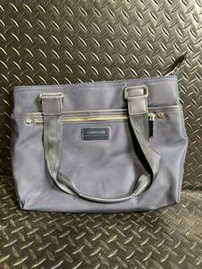 lot 172 image: Calvin Klein Navy Tote Bag - Dual Handles & Front Zip Pocket