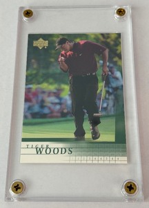 lot 12 image: Tiger Woods RC 2001 Upper Deck #1 Rookie Golf Card