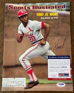 lot 14A image: Lou Brock Signed w PSADNA COA 1974 Sports Illustrated Magazine