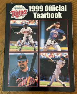 lot 34A image: Brad Radke, Matt Lawton, Todd Walker, Ron Coomer Signed 1999 Minnesota Twins Official baseball Yearbook