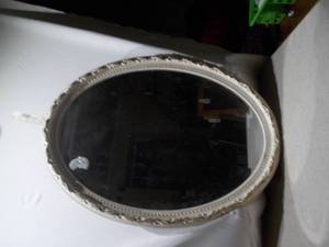 Vintage Oval Wall Mirror with Ornate Silver-Tone Frame
